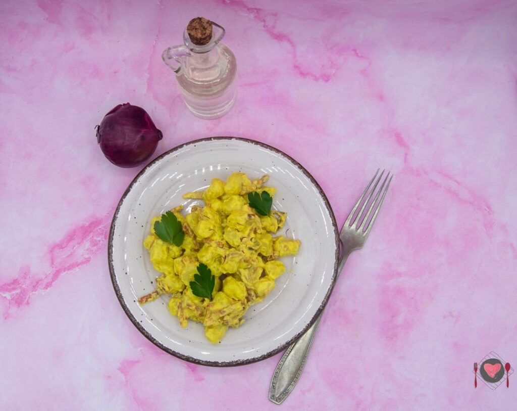 La foto raffigurante gli gnocchetti zafferano e speck: ricetta facile e veloce.