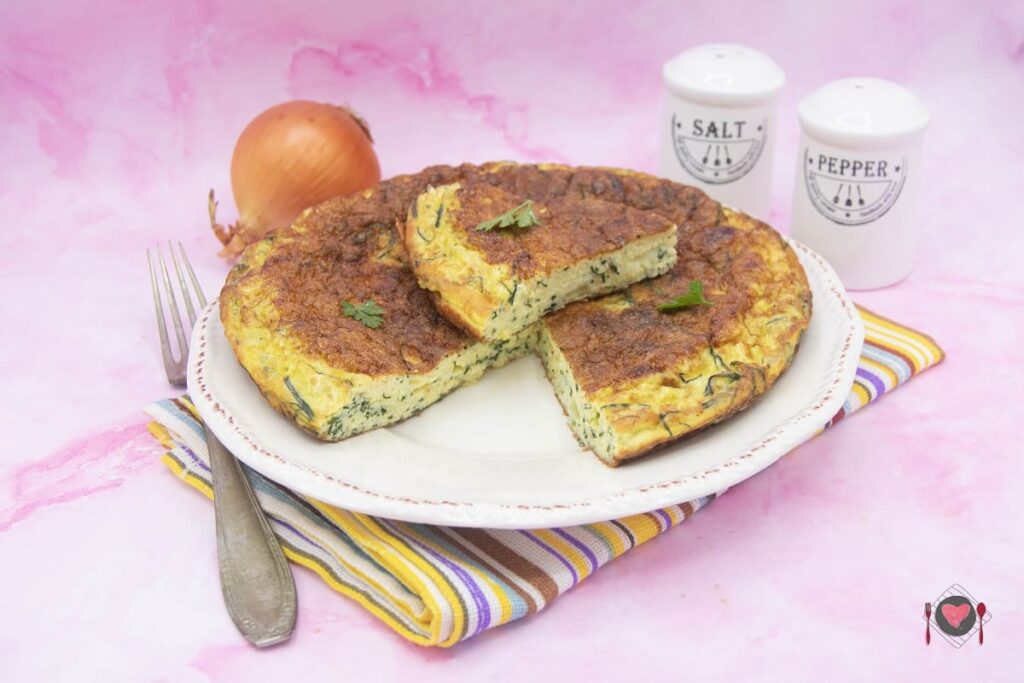 Frittata con gli agretti ( gustala in 25 minuti ) La foto raffigurante la frittata con gli agretti, dorata e invitante.